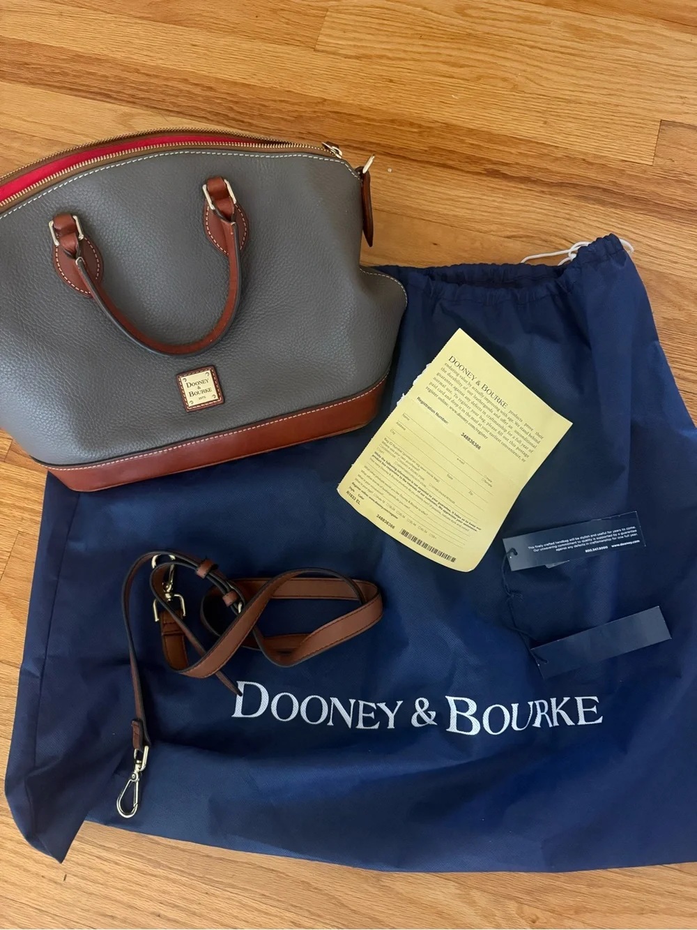 Dooney & Bourke Grey Pebble Leather Satchel with Brown Trim and Red Accent